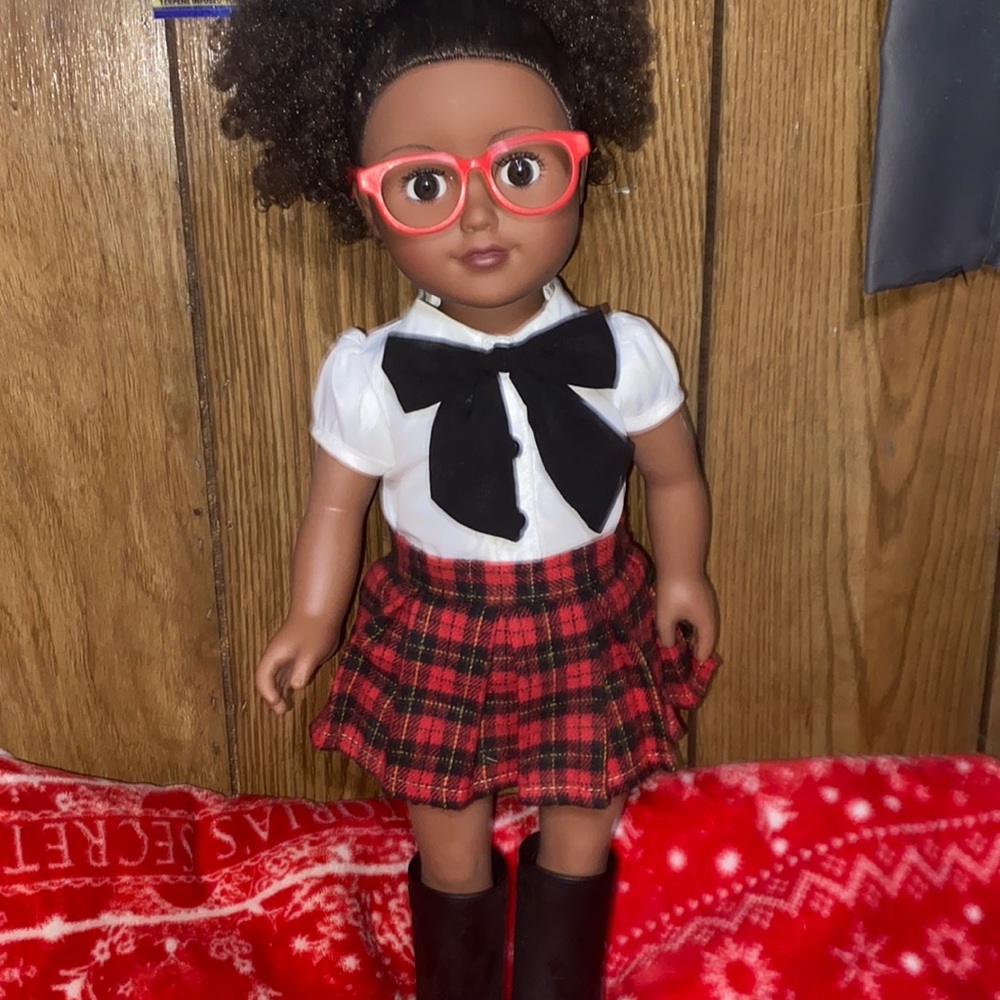 American Girl Doll African American. 18 inch doll. Still in very good condition.